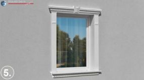 Fensterumrandung Fassade mit klassischem Zinnenmuster und Faschenverzierung mit Längsrillen